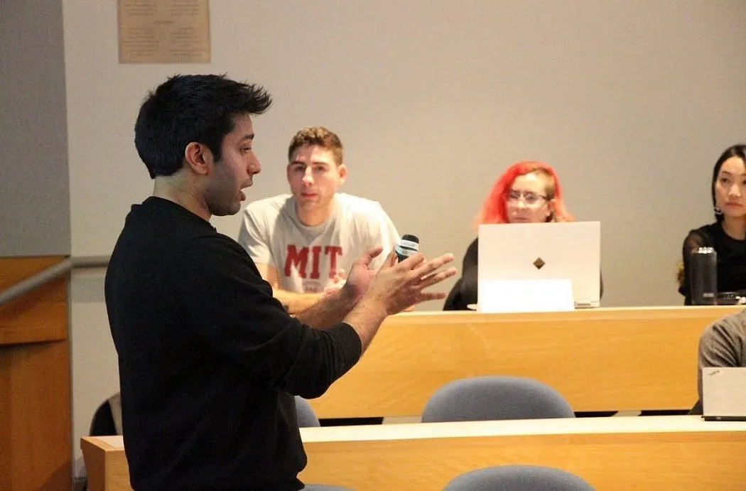 Hassan Akram answering a student’s question during an invited session at MIT Sloan.